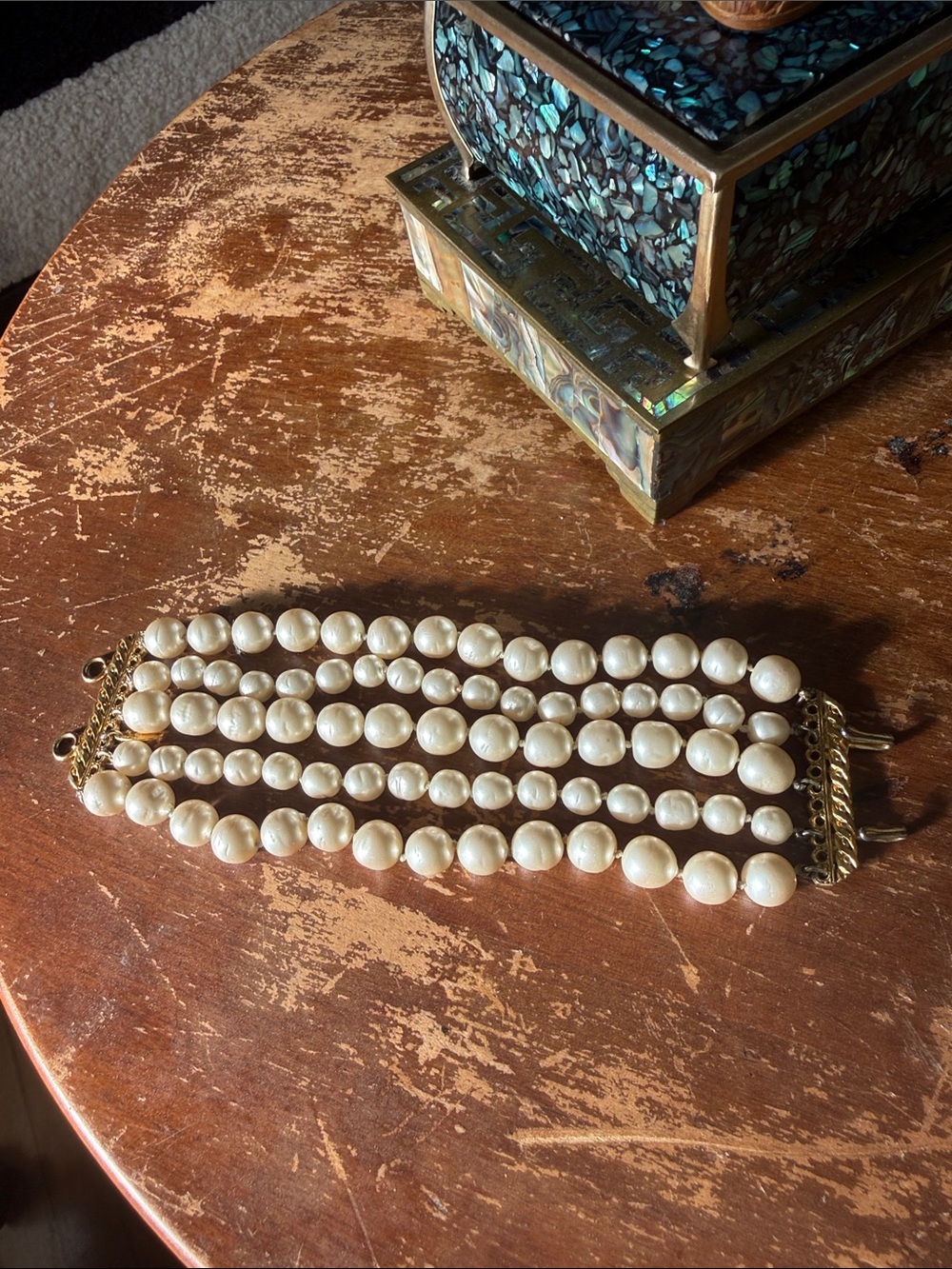 CHANEL Five-Strand Pearl Bracelet with Gold Hardware